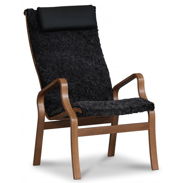 Lammet lenestol i saueskinn scandinavian dark grey - Brunbeiset eik
