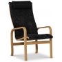 Frank lenestol i saueskinn scandinavian dark grey - Oljet eik