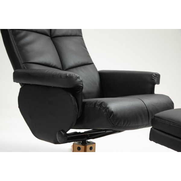 Duva hvilestol med fotskammel i sort PU med brune ben