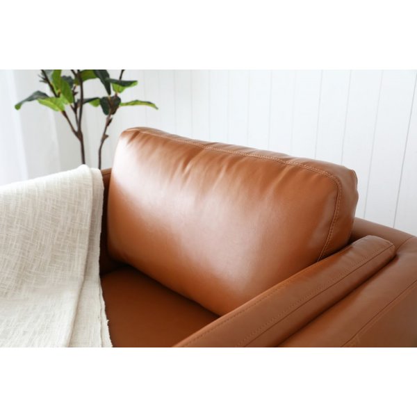 Cansas lenestol - Cognac PU + Tekstilrens for møbler Cansas lenestol - Cognac PU + Tekstilrens for møbler