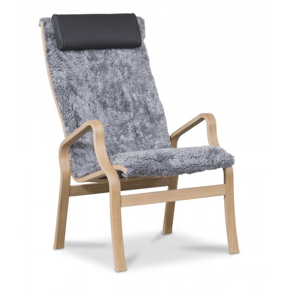 Svea lenestol med fotskammel - Gr�tt f�reskinn / oljet eik