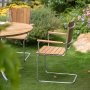 Mllan utegruppe i teak: 4 lenestoler med spisebord 110 cm