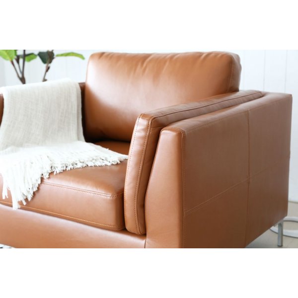 Cansas lenestol - Cognac PU + Tekstilrens for møbler Cansas lenestol - Cognac PU + Tekstilrens for møbler